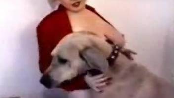Big-boobed zoofil slut trained her doggy for a good bestiality XXX