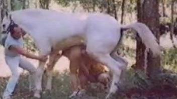 Short-haired chick is sucking a giant snake of a hot stallion