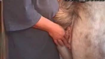 Voluptuous older woman experiments with full bestiality session on webcam
