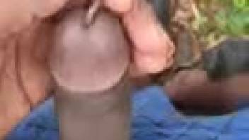 Aroused guy shoves a lengthy worm into his cock for kinky arousal