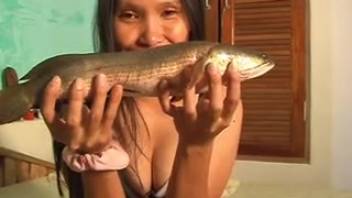 Experienced non-professional stimulates vagina using a fish in intense bestiality homemade footage