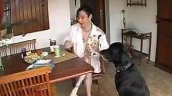 Fat MILF with a round booty fucking a black dog