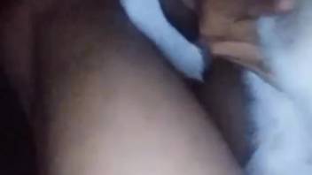 Naked man thrusts his entire cock deeply into a bitch's pussy