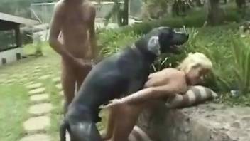 Tight female endures heavy dog cock right in the ass